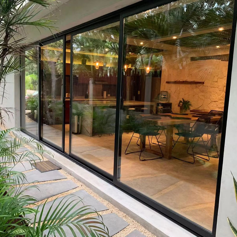 Isolamento acustico Porte scorrevoli in vetro UPVC in stile francese per un flusso senza soluzione di continuità all'interno e all'esterno